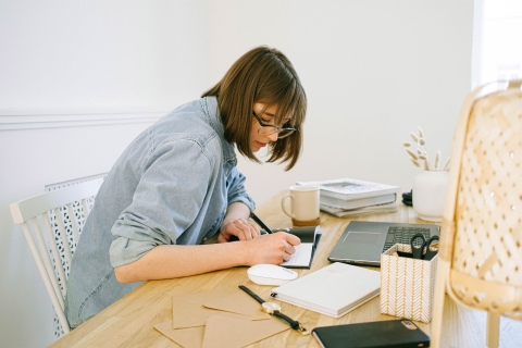 Asian women writing diary